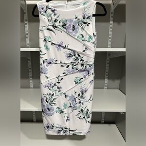 Calvin Klein Floral Starburst Sheath Dress Size 6.Pleats spray from the side